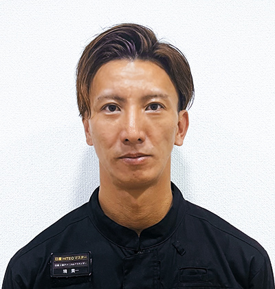境貴一さん